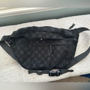 Black Crossbody Bag with Structured Design and Adjustable Strap